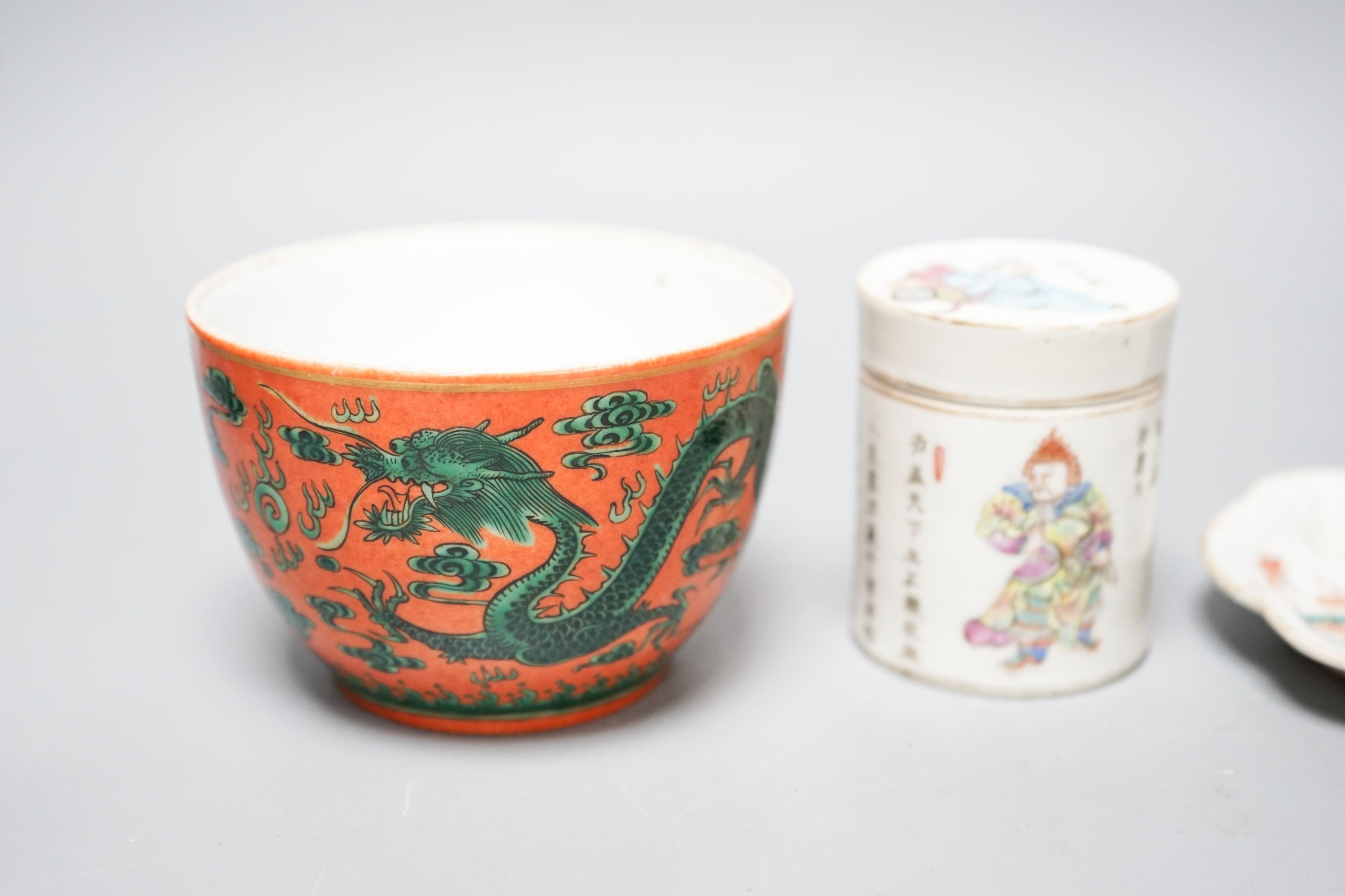 A Chinese orange ground dragon bowl, 11cm a famille rose box and cover and a similar pair of dishes, 19th century and later